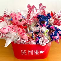 Arreglo con peluches y dulces